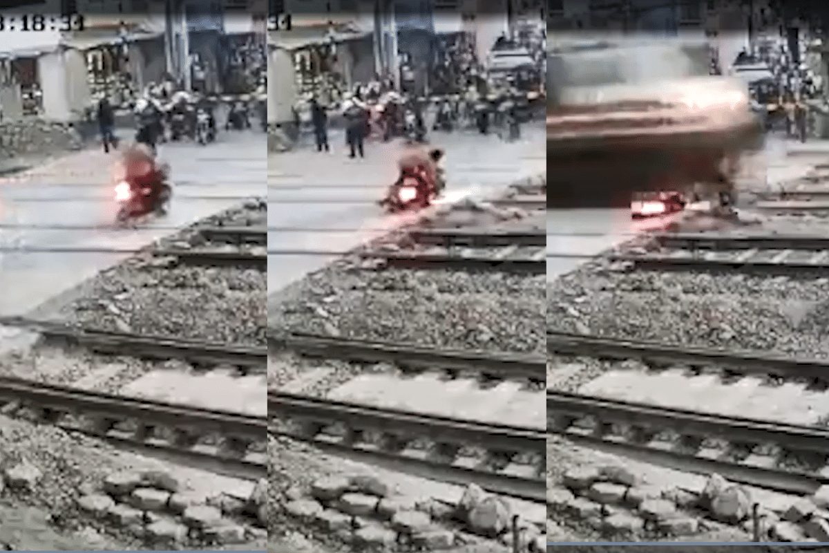 Noticia: India: Un motociclista se salvó de milagro de ser arrollado por un tren India: Un motociclista se salvó de milagro de ser arrollado por un tren