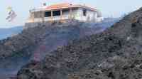 Noticia: Casa rodeada de lava sobrevive en durante la erupción volcánica en La Palma Casa rodeada de lava sobrevive en durante la erupción volcánica en La Palma