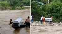 Noticia: Familiares trasladan un féretro sobre una llanta en río de Perú para sepultarlo en Ecuador Familiares trasladan un féretro sobre una llanta en río de Perú para sepultarlo en Ecuador